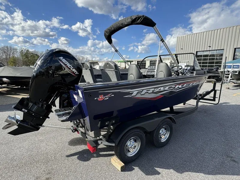 Slide: The Image of 2024 Tracker Targa™ V-18 Combo boat with Mercury outboard motor on trailer. - 6