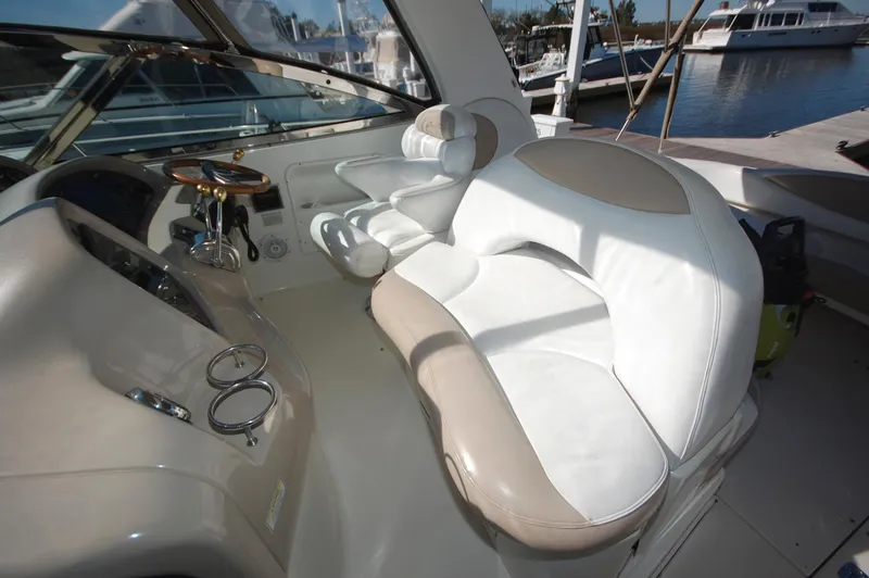 Slide: The Image of Helm seating area of a 2000 Sea Ray 380 Sundancer yacht. - 11