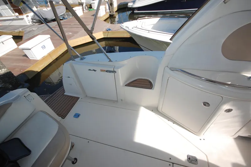 Slide: The Image of Sea Ray 380 Sundancer 2000 model boat deck at marina. - 15