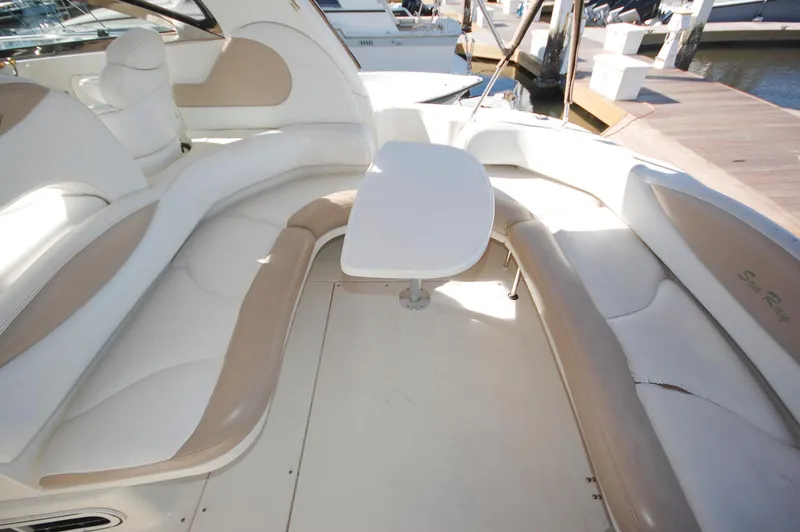 Slide: The Image of Interior seating area of a 2000 Sea Ray 380 Sundancer yacht at a marina. - 7