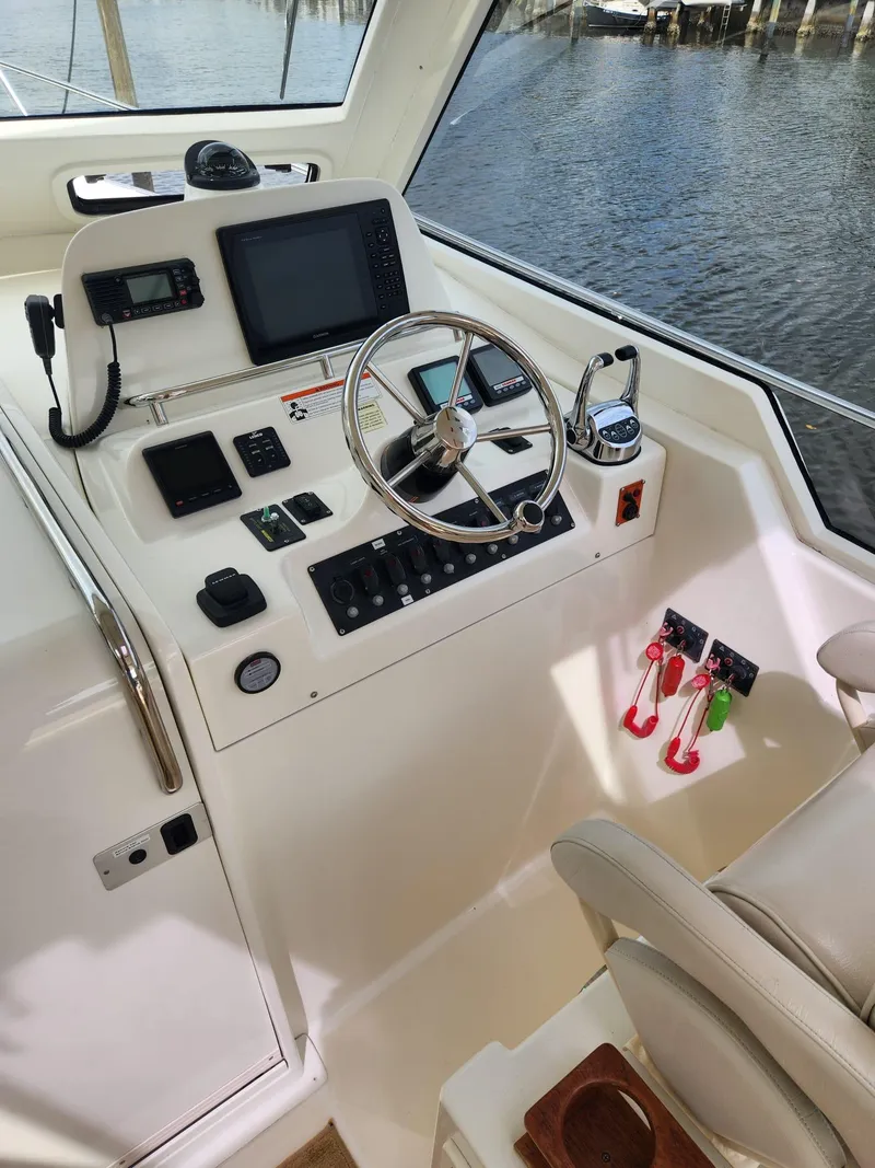 Slide: The Image of Helm station of a 2016 Marlow M34 Pilot boat with navigation equipment. - 11