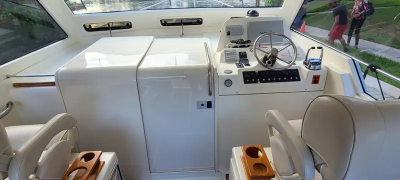 Slide: The Image of Interior of 2016 Marlow M34 Pilot boat with helm station and seating. - 12
