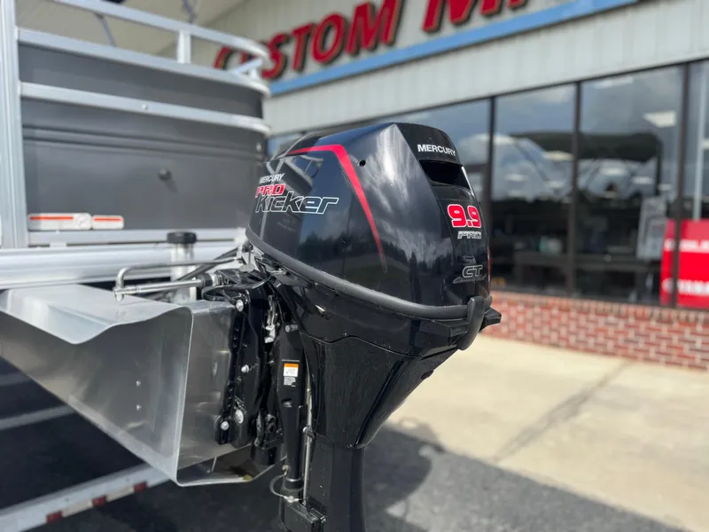 Slide: The Image of 2024 Sun Tracker Fishin' Barge 20 DLX with Mercury 9.9 Pro Kicker outboard motor. - 4