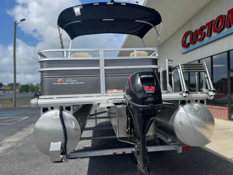 Slide: The Image of 2024 Sun Tracker Fishin' Barge 20 DLX pontoon boat with Mercury outboard motor. - 5