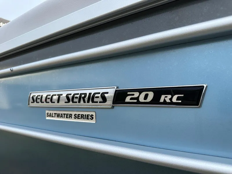 Slide: The Image of 2024 SunCatcher Select 20RC Saltwater Series boat emblem. - 2