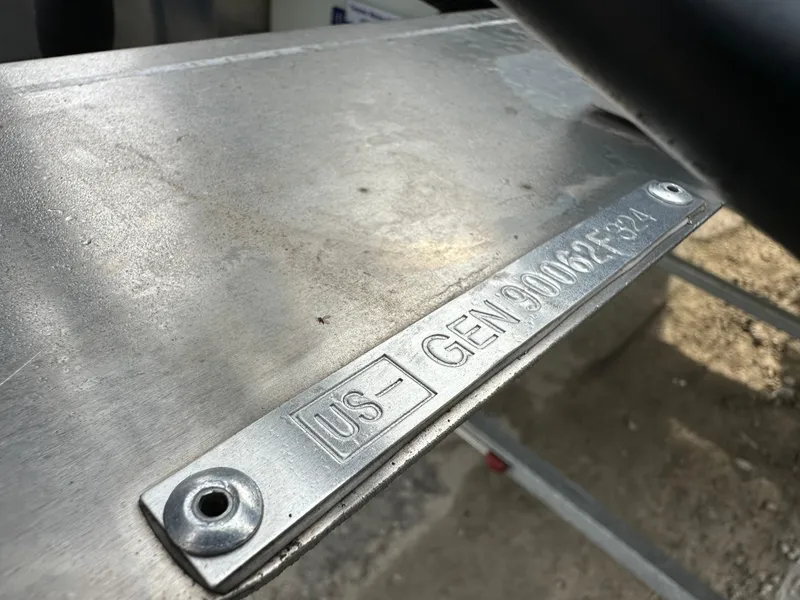 Slide: The Image of Close-up of the 2024 SunCatcher Select 20RC metal identification plate. - 20