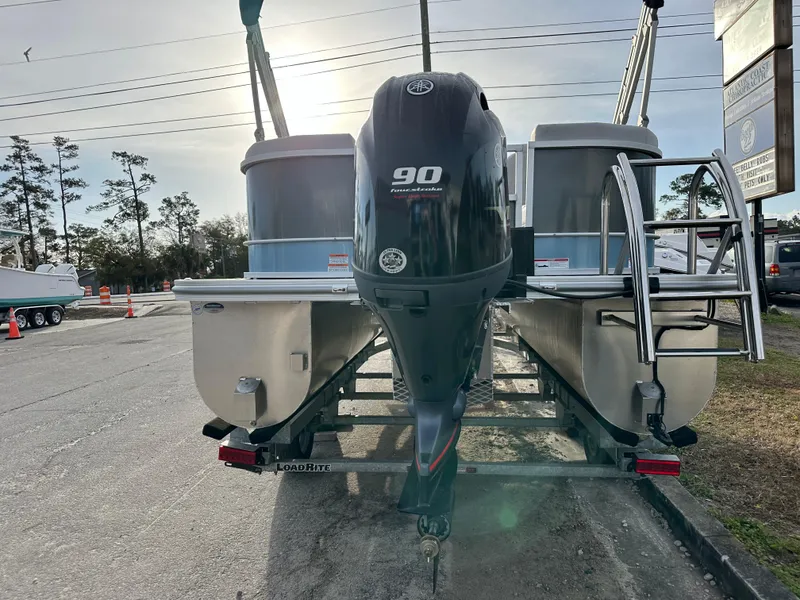 Slide: The Image of 2024 SunCatcher Select 20RC pontoon boat with 90 horsepower outboard motor. - 4