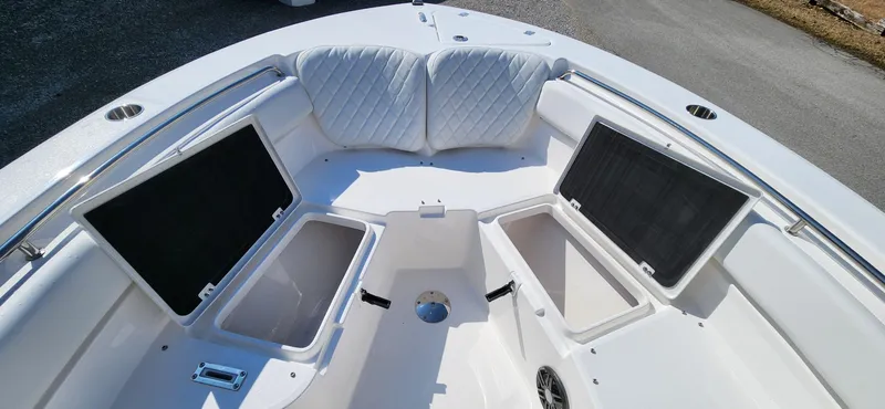 Slide: The Image of 2024 Sea Fox 248 Side Console boat with open storage compartments. - 12