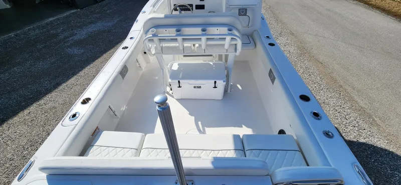 Slide: The Image of 2024 Sea Fox 248 Side Console boat interior with seating and storage. - 3