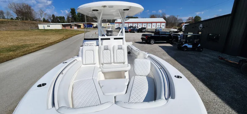 Slide: The Image of 2024 Sea Fox 248 Side Console boat with spacious seating and modern design. - 4
