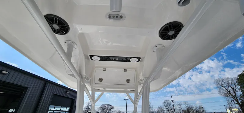 Slide: The Image of 2024 Sea Fox 248 Side Console boat roof with speakers and lights. - 7