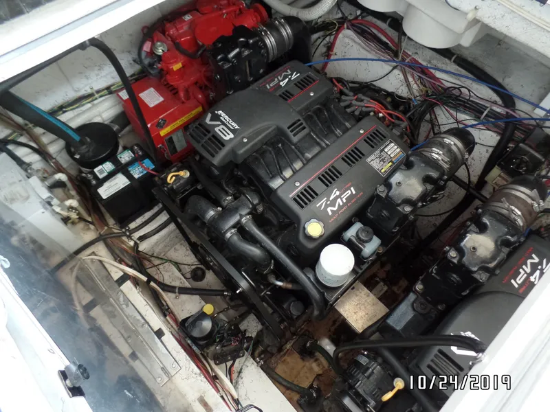 Slide: The Image of Engine compartment of a 2000 Maxum 3300 SCR boat with twin MerCruiser engines. - 31