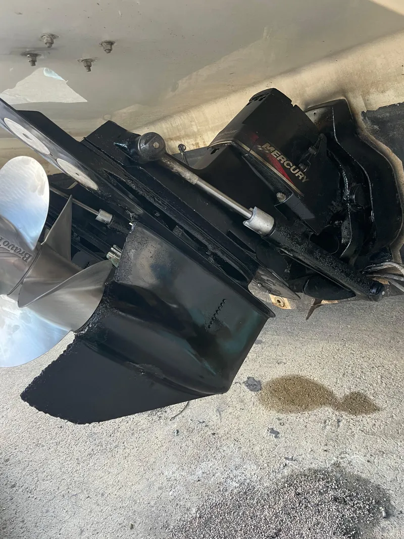 Slide: The Image of Close-up of a 2000 Maxum 3300 SCR boat's MerCruiser outdrive. - 37