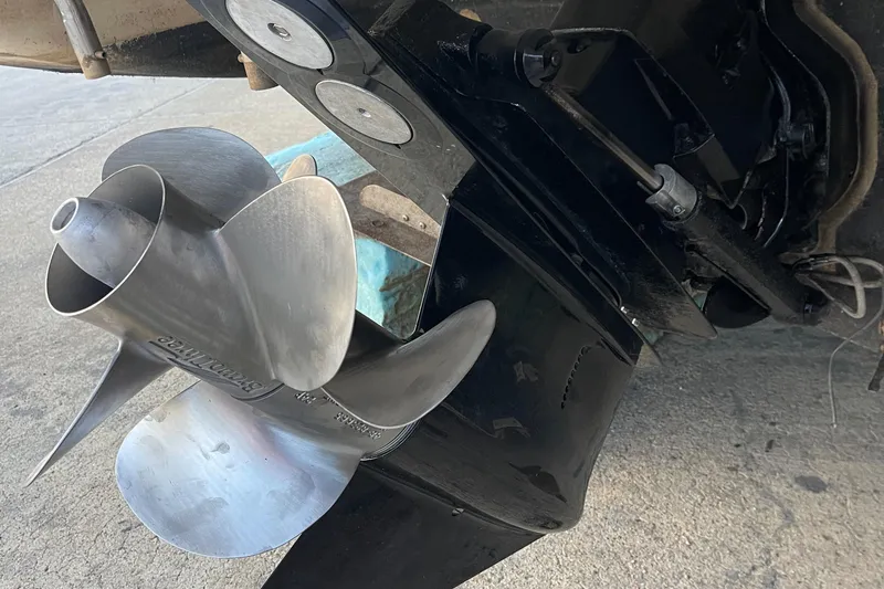 Slide: The Image of Close-up of a 2000 Maxum 3300 SCR boat propeller and stern drive. - 38