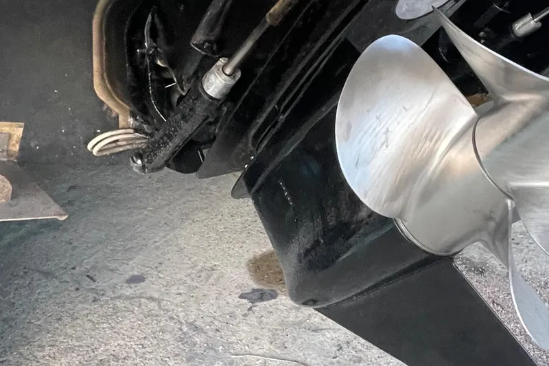 Slide: The Image of Close-up of 2000 Maxum 3300 SCR boat propeller and stern drive. - 39