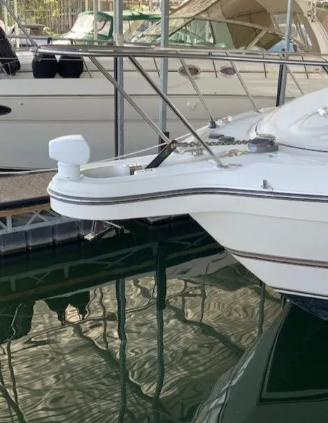 Slide: The Image of 2000 Maxum 3300 SCR boat docked at marina. - 7