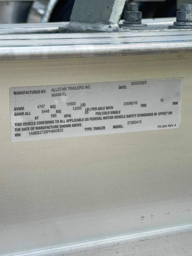 Slide: The Image of Label on Allstar Trailers Inc, detailing specifications and compliance, dated 02/05/2023. - 20