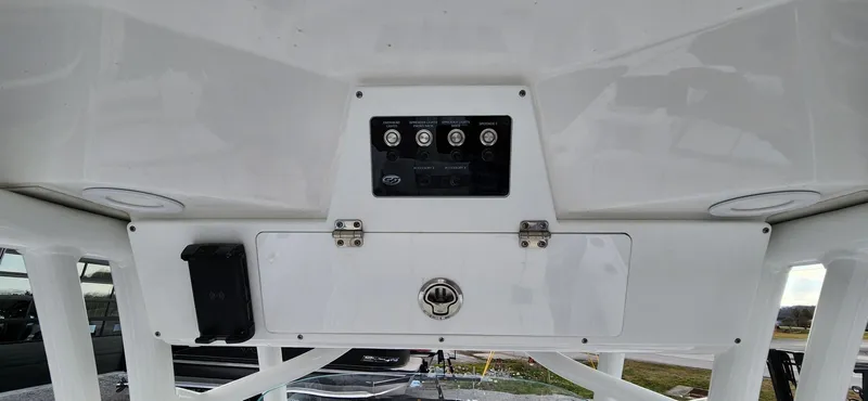Slide: The Image of 2024 Sea Fox 248 Commander boat console with control panel and storage compartment. - 10