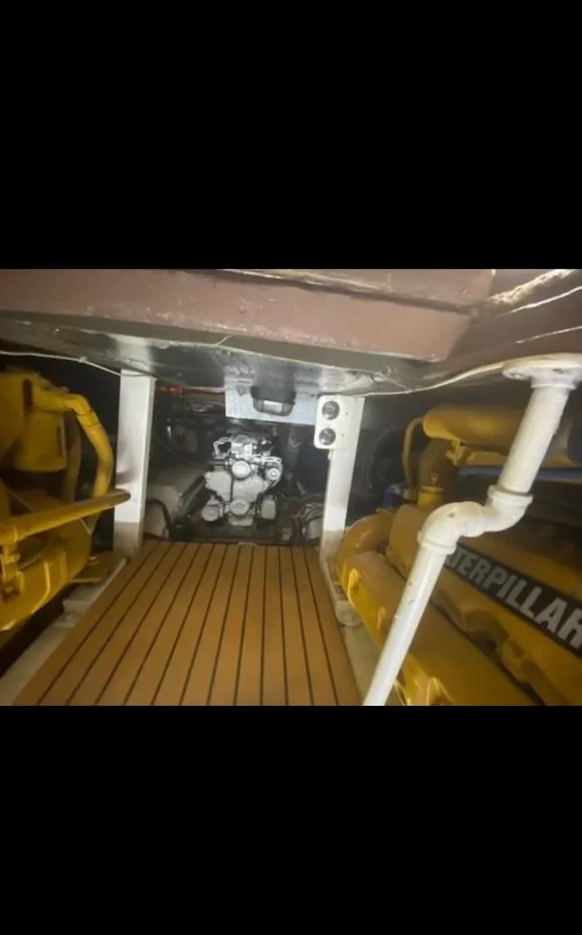 Slide: The Image of Engine room of 1985 Ocean 38 Super Sport boat with Caterpillar engines. - 10