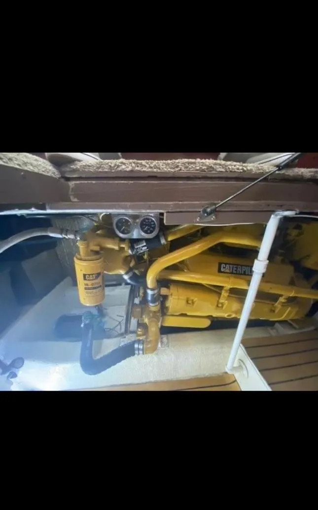 Slide: The Image of Engine compartment of a 1985 Ocean 38 Super Sport boat with Caterpillar engine. - 19