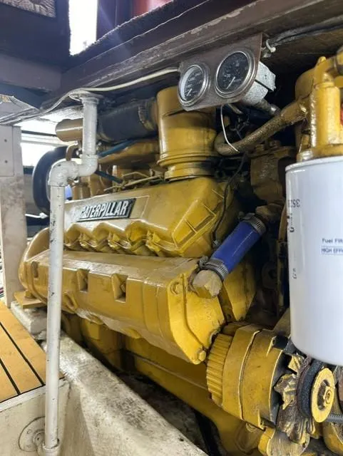Slide: The Image of 1985 Ocean 38 Super Sport engine compartment with Caterpillar engine. - 43