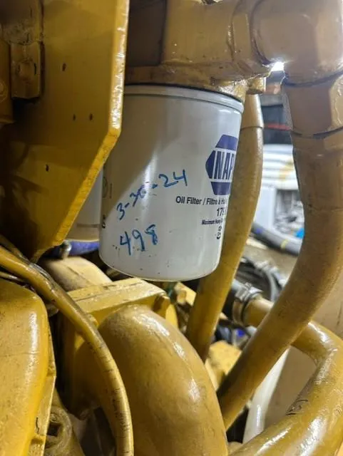 Slide: The Image of Oil filter in 1985 Ocean 38 Super Sport engine compartment. - 49