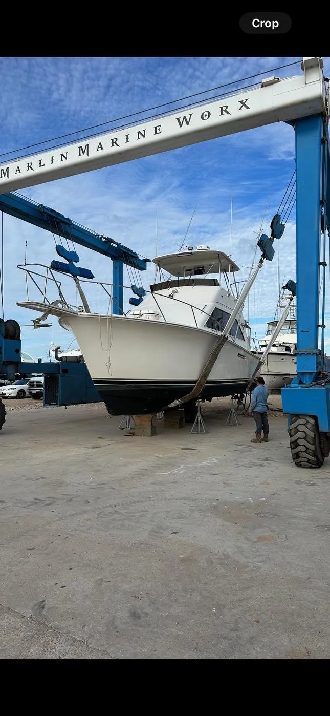 Slide: The Image of 1985 Ocean 38 Super Sport boat in dry dock at Marlin Marine Worx. - 7