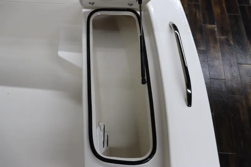 Slide: The Image of 2023 May-Craft 2200 Bay boat storage compartment with handle and hydraulic lift. - 18