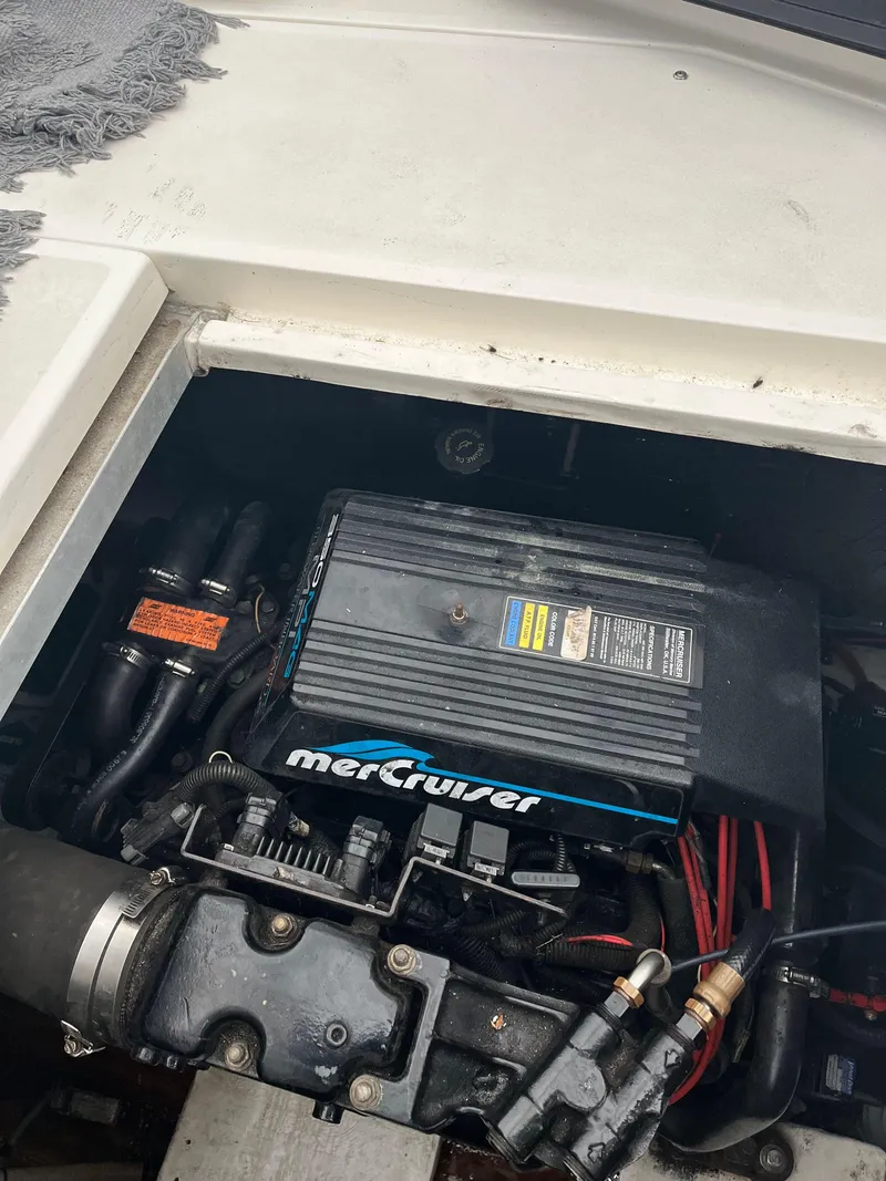 Slide: The Image of Engine compartment of a 2000 Cruisers Yachts 3375 Express with MerCruiser engine. - 21