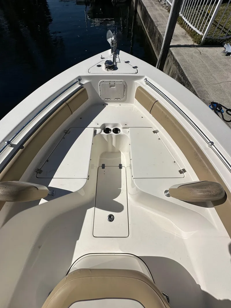 Slide: The Image of 2019 Key West 239 FS boat bow with seating and storage compartments. - 20
