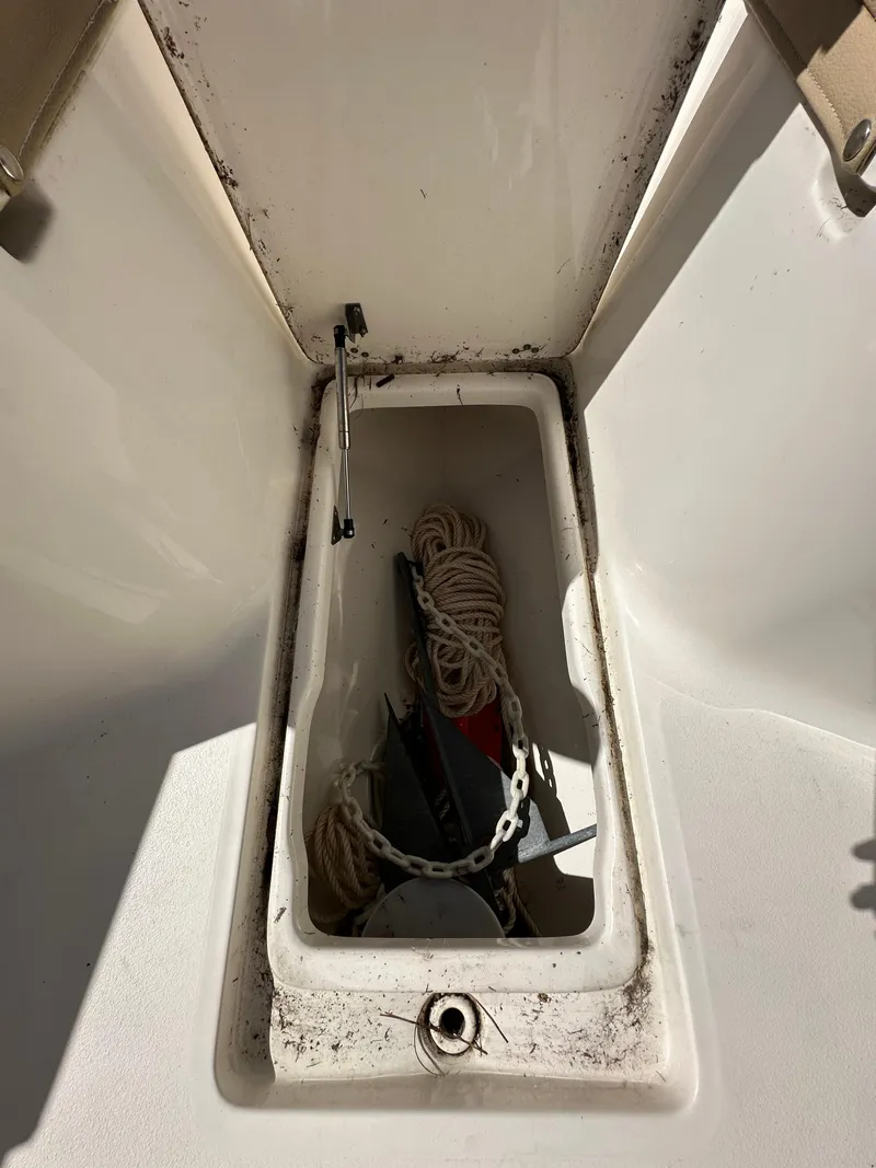 Slide: The Image of Anchor storage compartment on a 2019 Key West 239 FS boat. - 27