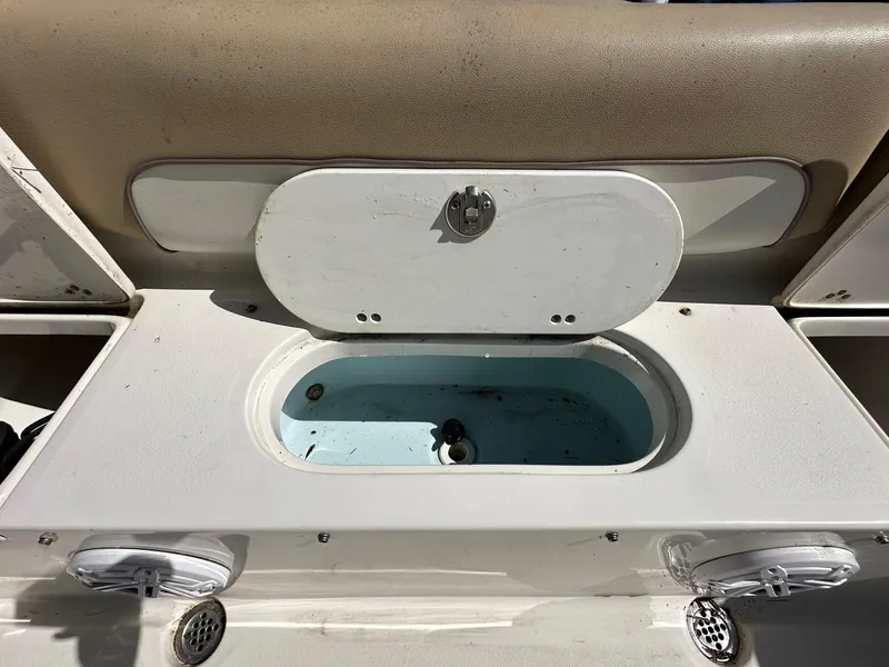 Slide: The Image of 2019 Key West 239 FS boat livewell with open lid. - 41