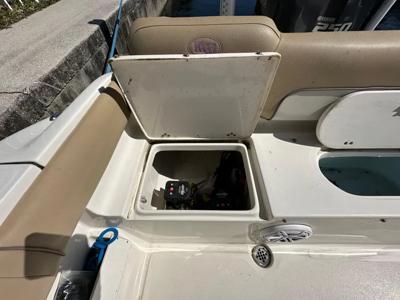 Slide: The Image of Open storage compartment on a 2019 Key West 239 FS boat. - 42