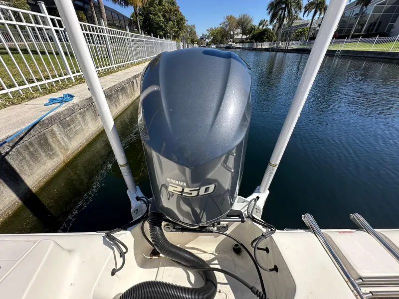 Slide: The Image of 2019 Key West 239 FS boat with Yamaha F250 outboard motor on a canal. - 45