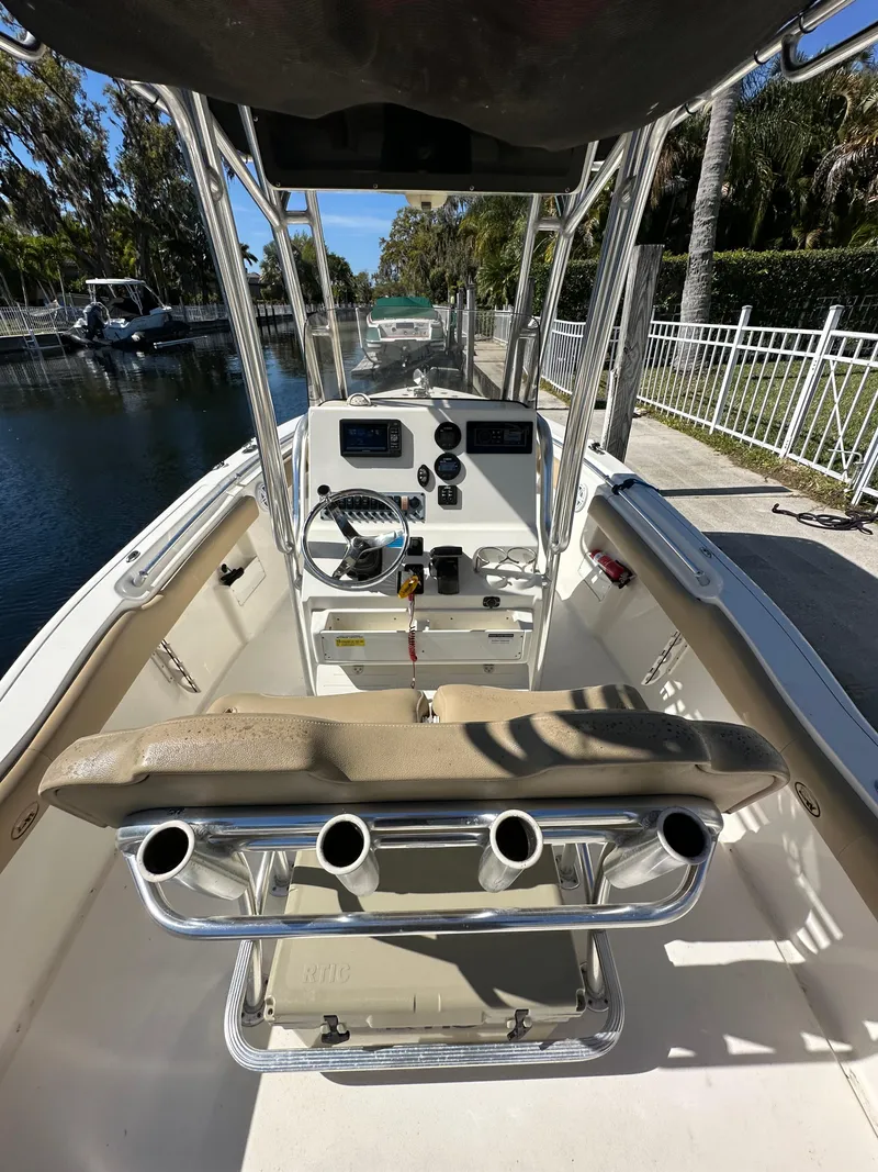 Slide: The Image of 2019 Key West 239 FS boat interior with console and seating. - 9