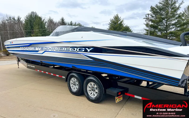 Slide: The Image of 2022 MTI 390X boat on trailer, American Custom Marine. - 14