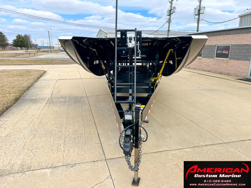 Slide: The Image of MTI 390X boat trailer, 2022 model, at American Custom Marine parking lot. - 17