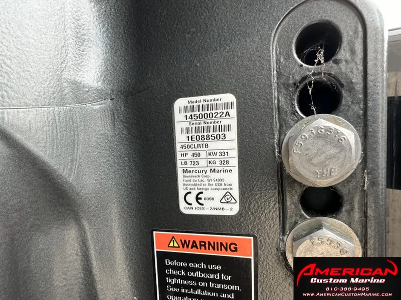 Slide: The Image of MTI 390X 2022 boat label with warning and serial number. - 19