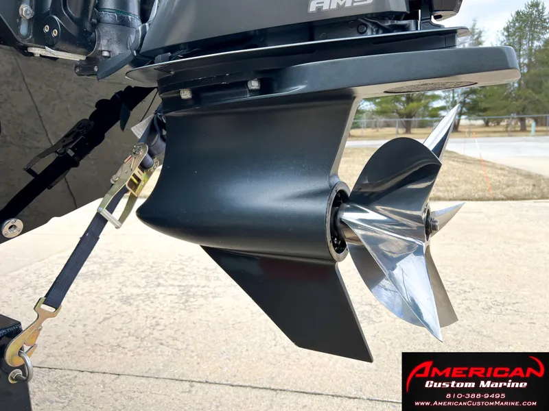 Slide: The Image of MTI 390X 2022 boat motor with shiny propeller, American Custom Marine. - 20