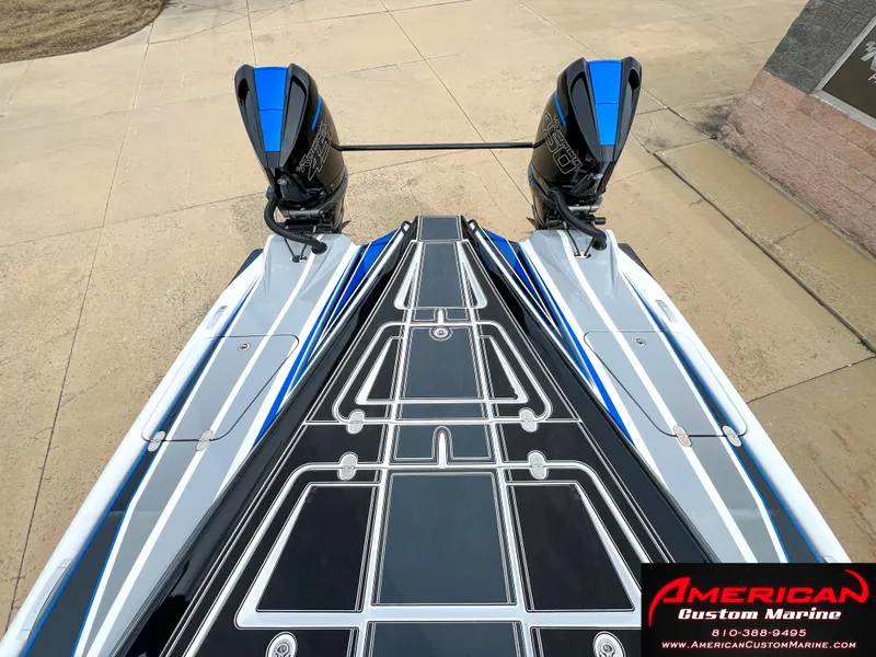 Slide: The Image of MTI 390X boat from 2022 with dual engines, American Custom Marine. - 31