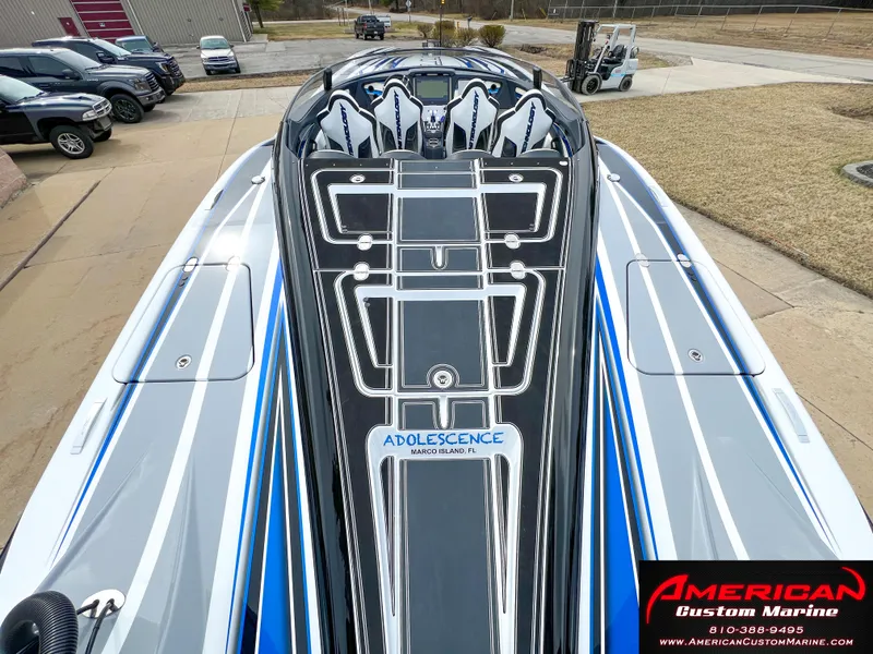 Slide: The Image of MTI 390X 2022 boat with sleek design, American Custom Marine. - 32