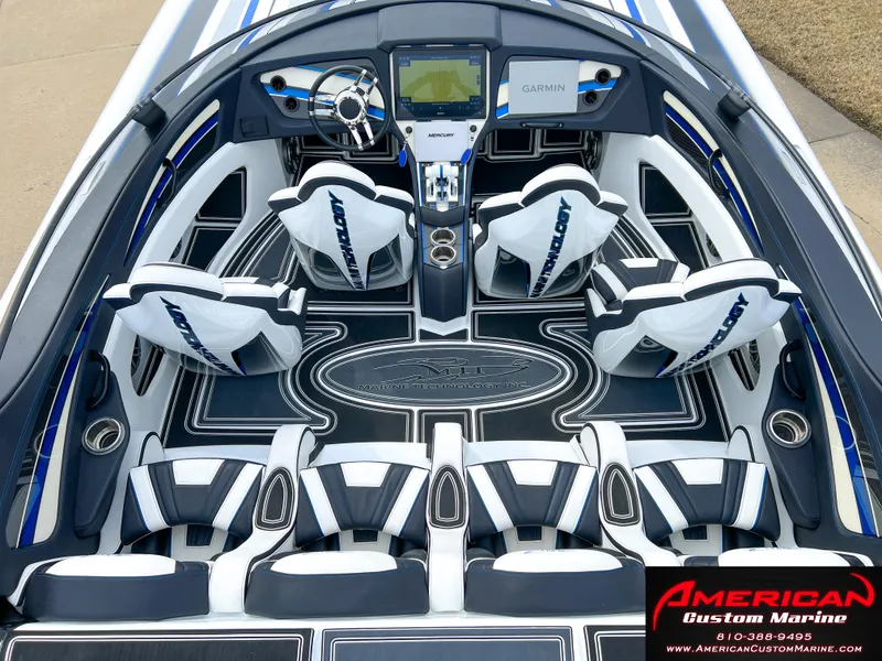 Slide: The Image of Interior of a 2022 MTI 390X boat with luxurious seating. - 34