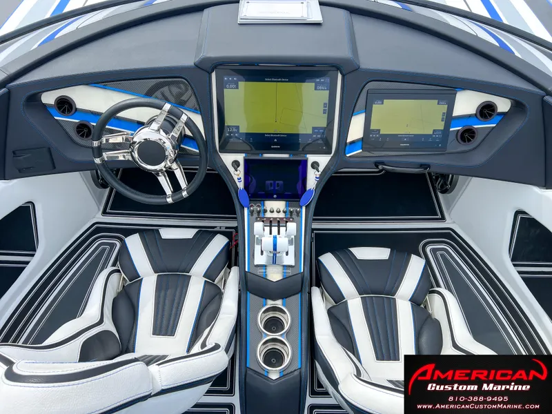 Slide: The Image of Interior of a 2022 MTI 390X boat with modern control console. - 35