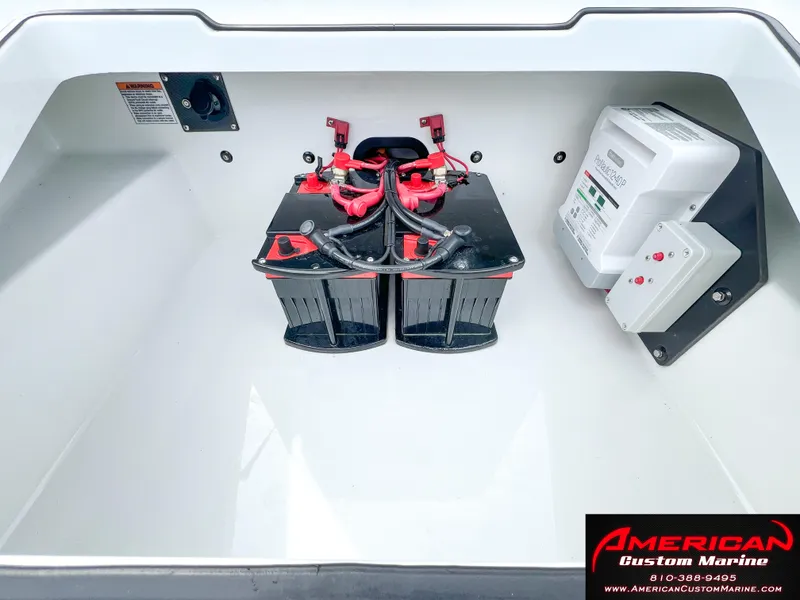 Slide: The Image of MTI 390X 2022 battery compartment with wiring and control unit. - 42