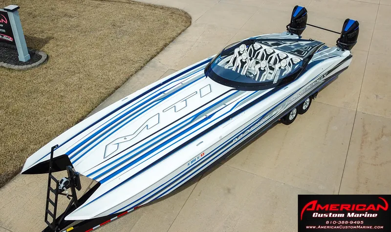 Slide: The Image of MTI 390X 2022 high-performance boat on trailer, American Custom Marine. - 48