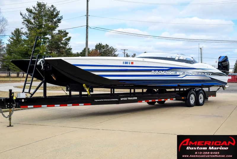 Slide: The Image of MTI 390X 2022 on trailer at American Custom Marine. - 5