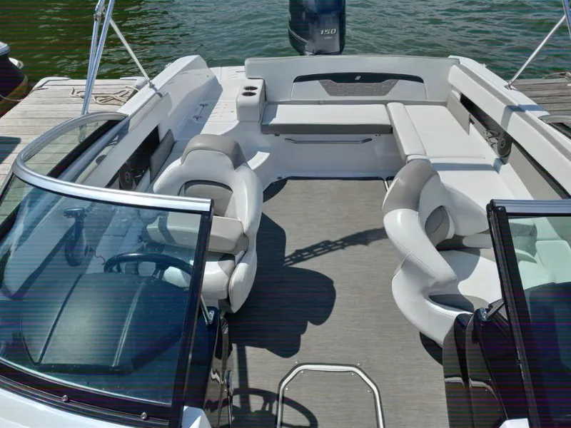 Slide: The Image of 2022 Four Winns HD2 boat interior with spacious seating and modern design. - 10