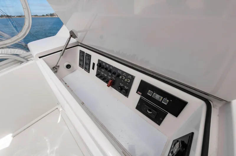 Slide: The Image of 2005 Viking Convertible yacht control panel with ocean view. - 16