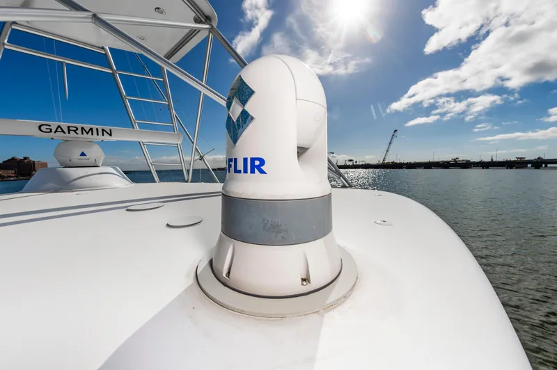 Slide: The Image of 2005 Viking Convertible yacht with Garmin and FLIR equipment under sunny skies. - 21