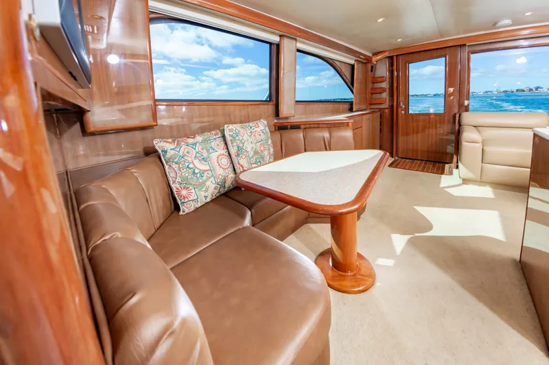 Slide: The Image of Luxurious interior of a 2005 Viking Convertible yacht with leather seating and ocean view. - 34